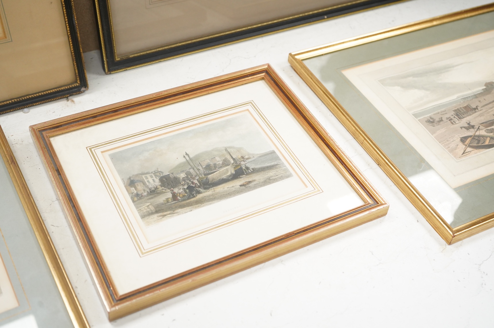 A collection of 19th century and later prints, some Brighton interest to include: Summer's evening at the Royal Marine Library, Brighton, The Lanes and other views of Worthing, Hastings and near Beachy Head, largest 35 x